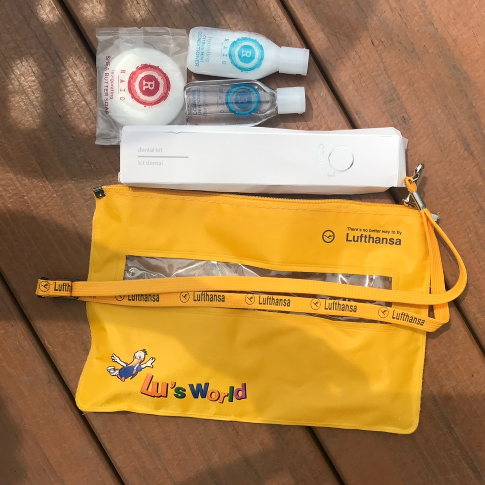 Yellow Lufthansa travel bag with accessories as pictured